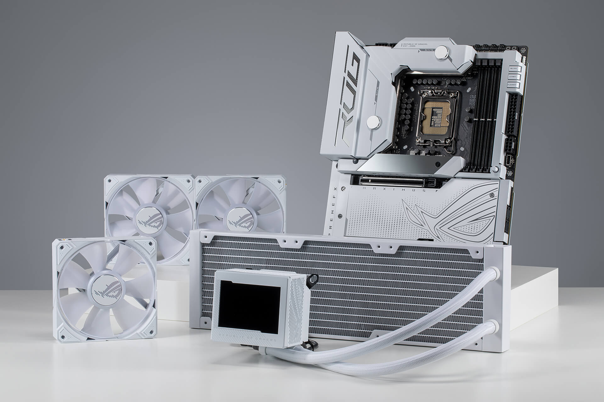 Front view photo of ROG Maximus Z790 Formula paired with ROG Ryujin III 360 ARGB White Edition standing on a desktop.