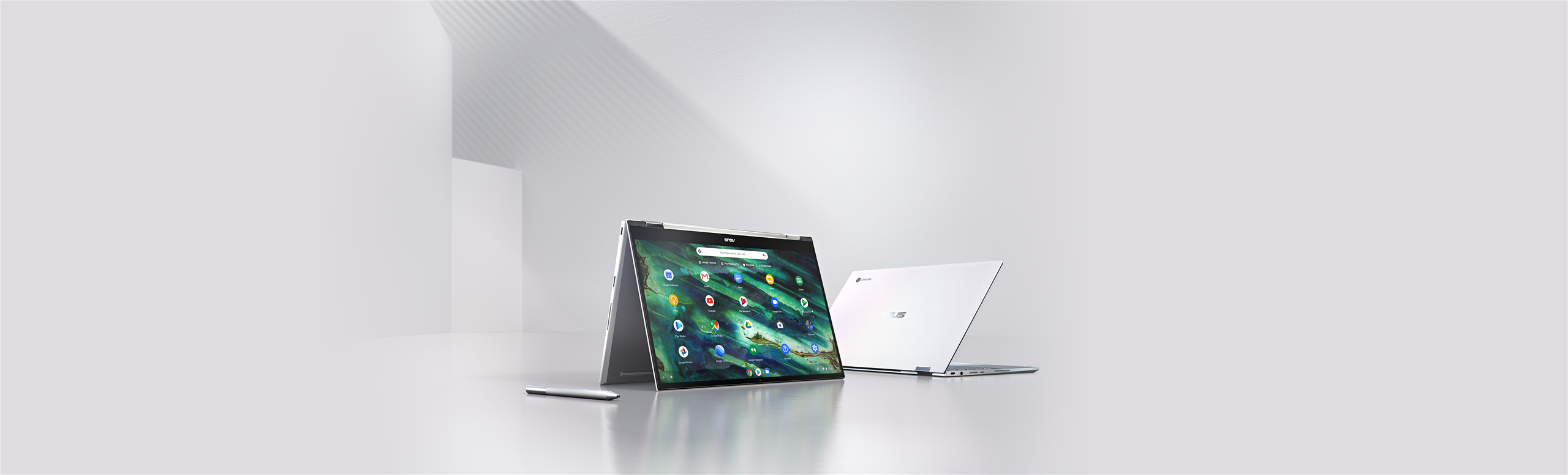 Two ASUS Chromebook Flip C436 are shown. The one at the front is in tent mode with an ASUS Pen beside. The other one at the back is in laptop mode showing its Immersive White cover.