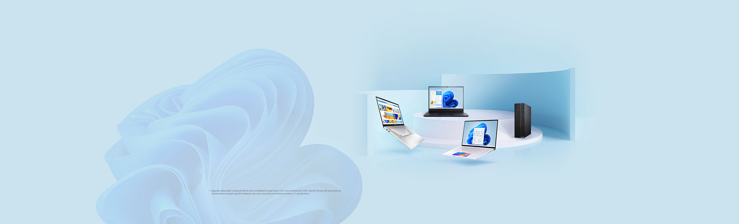 Three ASUS laptops and one ASUS desktop are shown along with different Windows wallpaper in its screen.