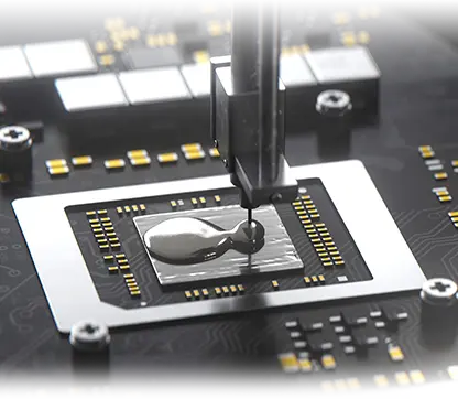 A close-up view of liquid metal being applied to the CPU.