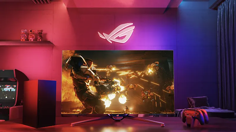ROG Swift OLED gaming monitor on desktop setup