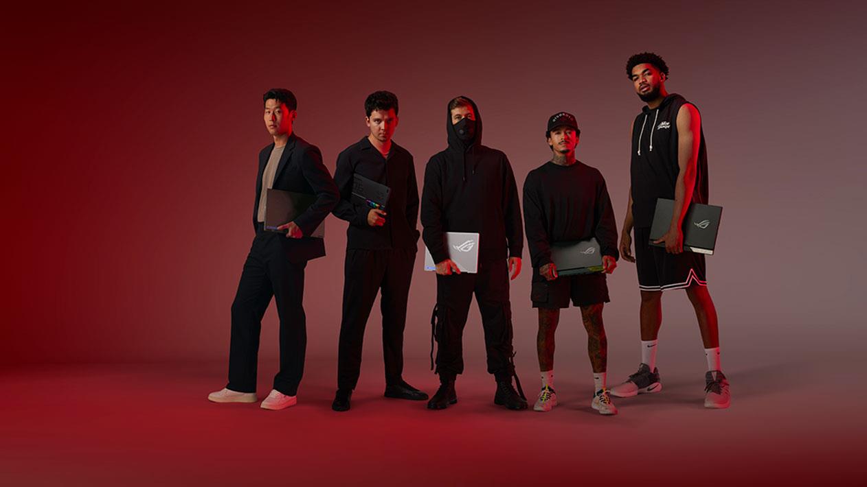 ROG's five ambassadors Asa Butterfield, Nyjah Huston, Karl-Anthony Towns, Alan Walker, and Son Heung-Min wearing black and standing against a red screen